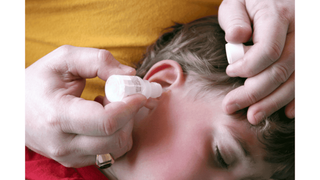 Administering medicine into child's ear